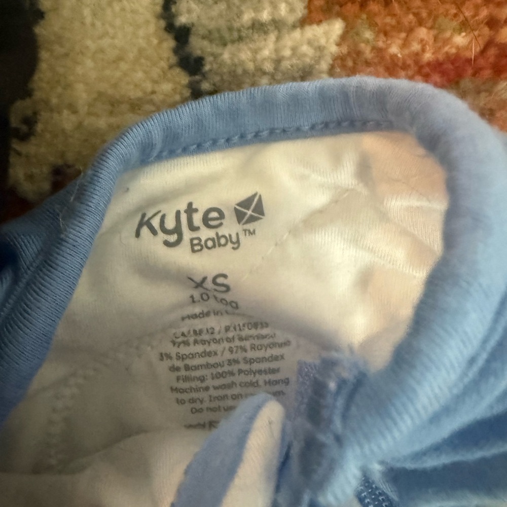 Kyte Baby Blue and black swaddle. Sold together